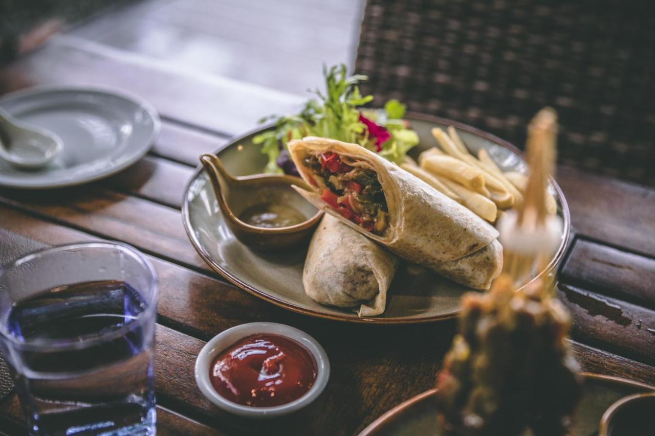 The Andaman, A Luxury Collection Resort, Langkawi Esterno foto A plate of spring rolls